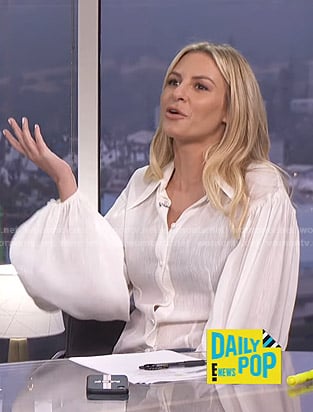 Morgan's white bishop sleeve blouse on E! News Daily Pop