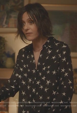 Paige's black star print blouse on Grown-ish