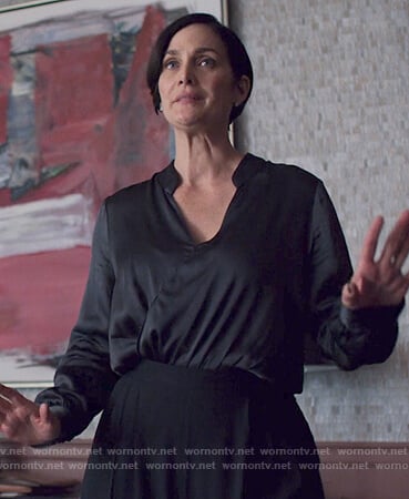 Jeryn's black satin bodysuit on Jessica Jones