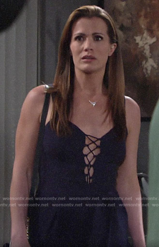 Chelsea's navy lace-up front jumpsuit on The Young and the Restless