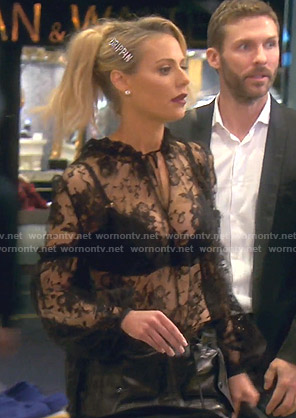 Dorit's black tie neck lace shirt on The Real Housewives of Beverly Hills