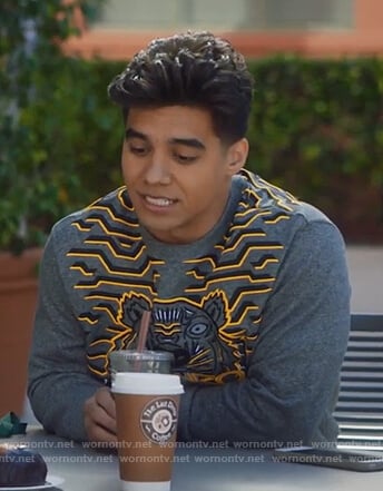 Vivek's gray tiger print sweatshirt on Grown-ish
