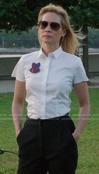 Joan's purple flower brooch on Elementary