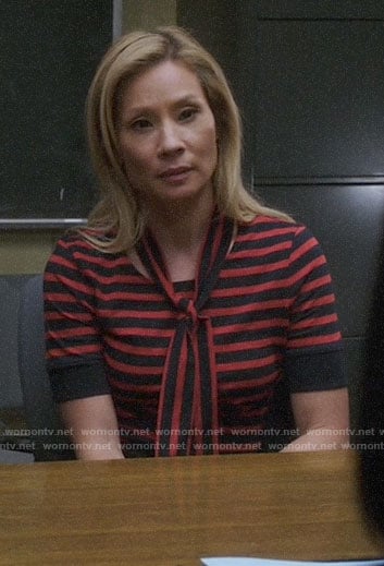 Joan's red striped tie-neck top on Elementary