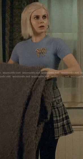 Liv's blue sweater with embellished palm tree and grey plaid skirt on iZombie