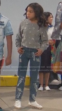 Nia's pearl embellished sweater and lightning bolt jeans on Ravens Home