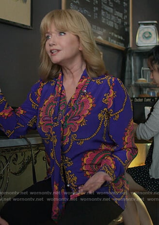 Dorothy's printed tie neck blouse on Jessica Jones