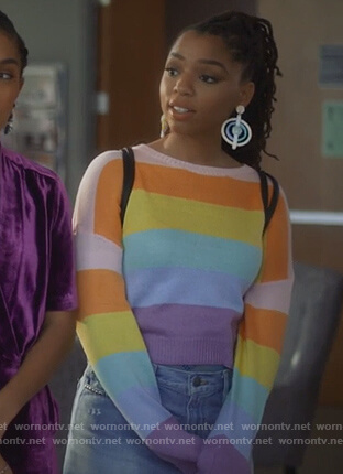 Jazlyn's striped sweater and studded denim skirt on Grown-ish