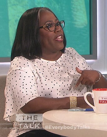 Sheryl's white polka dot top on The Talk
