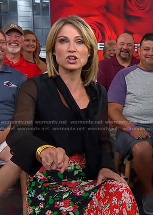 Amy's black tie neck top and floral skirt on Good Morning America