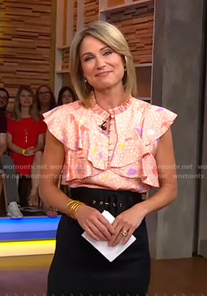 Amy's pink floral ruffled top and black skirt on Good Morning America
