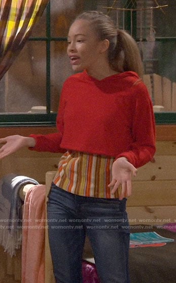 Ava's red cropped hoodie and patchwork sneakers on Bunkd