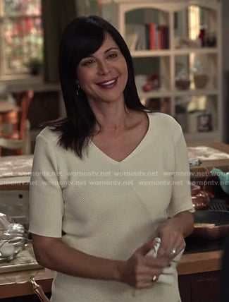 Cassie's white ribbed asymmetric top on Good Witch