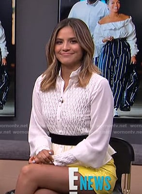 Erin's white smocked blouse on E! News