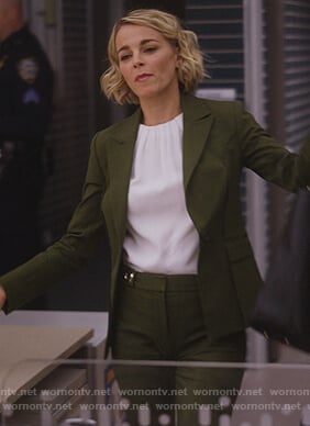 Lizzie's green tie back blazer and white top on Instinct