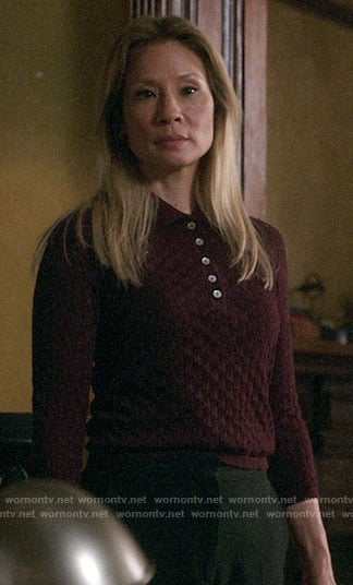 Joan's burgundy textured polo sweater on Elementary
