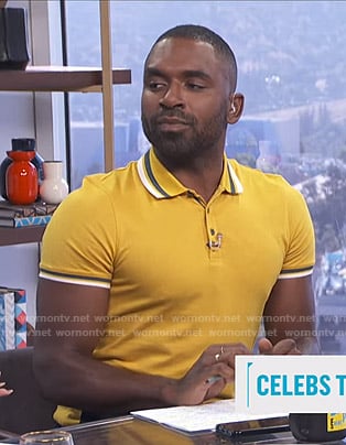 Justin's yellow polo shirt on E! News Daily Pop