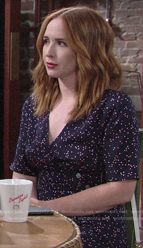Mariah's navy polka buttoned wrap dress on The Young and the Restless