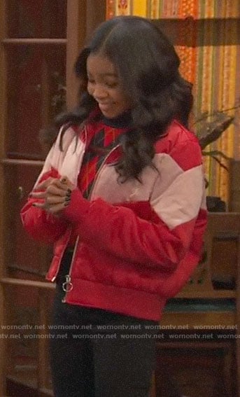 Nia's red chevron puffer jacket on Ravens Home