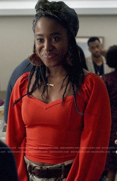 Nicole's red puff sleeve top on Veronica Mars