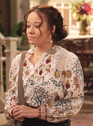 Jade's white print blouse with lace insets on Family Reunion