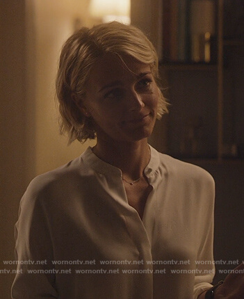 Lizzie's white slit back blouse on Instinct