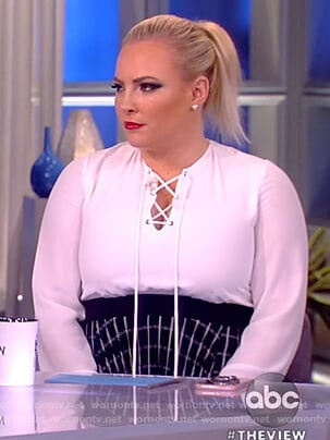 Meghan's white blouse and check skirt on The View