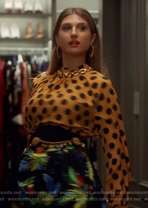 Nomi's polka dot top and print skirt on Grown-ish