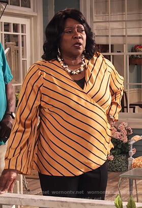 MDear's gold striped wrap top on Family Reunion
