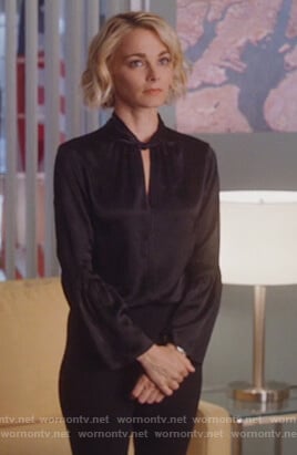 Lizzie's black twist neck blouse on Instinct