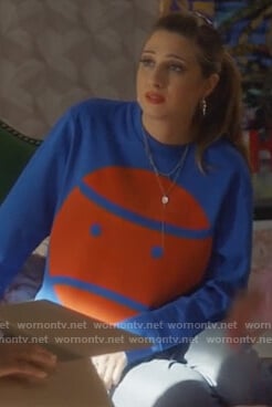 Nomi's blue face sweater on Grown-ish