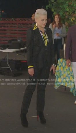 Christine's floral blouse and black pinstriped suit on BH90210
