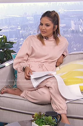 Erin's pink sweatshirt jumpsuit on Live from E!