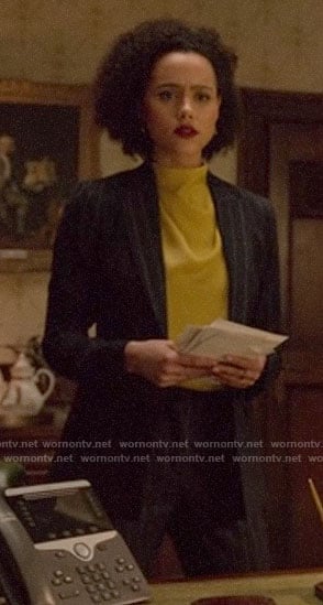 Maya's yellow blouse and pinstripe suit on Four Weddings and a Funeral