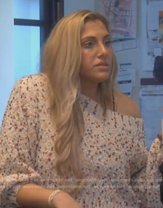 Gina's white confetti embellished sweater on The Real Housewives of Orange County
