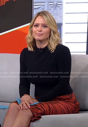Sara's orange zebra print skirt on GMA Strahan And Sara