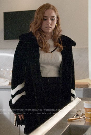 Zara's black fur coat with striped sleeves on Four Weddings and a Funeral