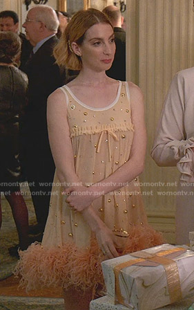 Lauren's orange feather trimmed dress on Younger