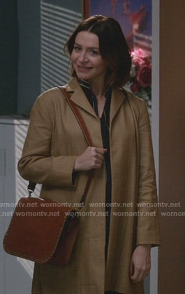 Amelia's striped blouse and beige coat on Greys Anatomy