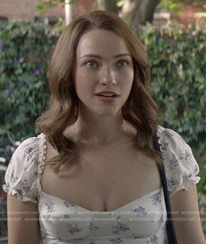 Cara's white floral short sleeve top on God Friended Me