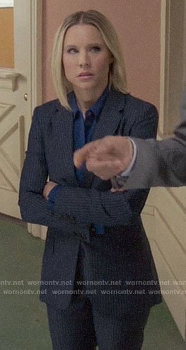 Eleanor's navy striped suit on The Good Place