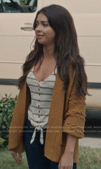 Haley's mustard cardigan on Modern Family