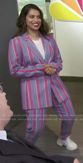 Lilly Singh's blue and red striped suit on A Little Late with Lilly Singh