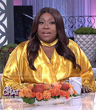 Loni's yellow choker neck dress on The Real