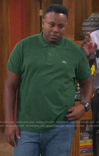 Marty's green polo shirt on The Neighborhood