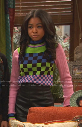 Nia's mixed checkerboard sweater on Ravens Home