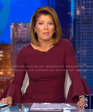 Norah's burgundy bell sleeve dress on CBS Evening News