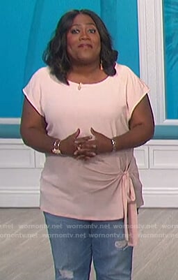 Sheryl's pink tie front top on The Talk