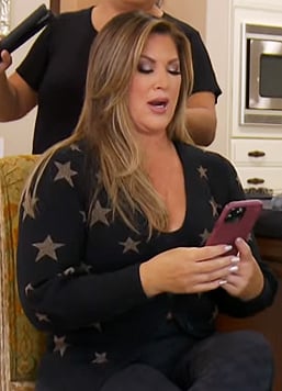 Emily's black star print cardigan on The Real Housewives of Orange County