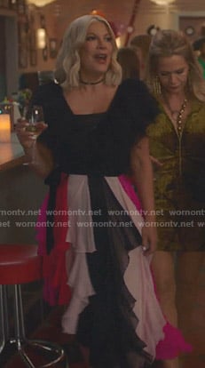 Tori's black feather-trim v-neck top on BH90210